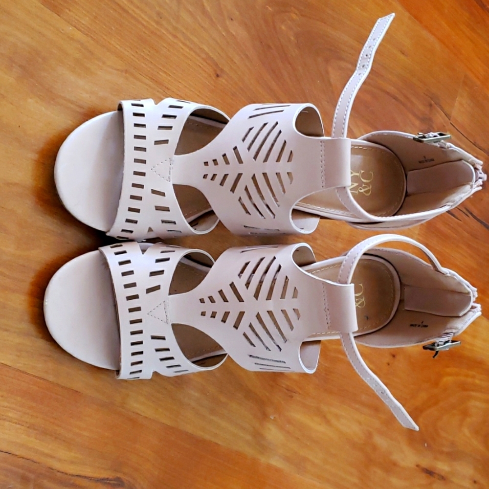 Nude colored cut put sandals with 6 inch heel and zipper back for easy on and of